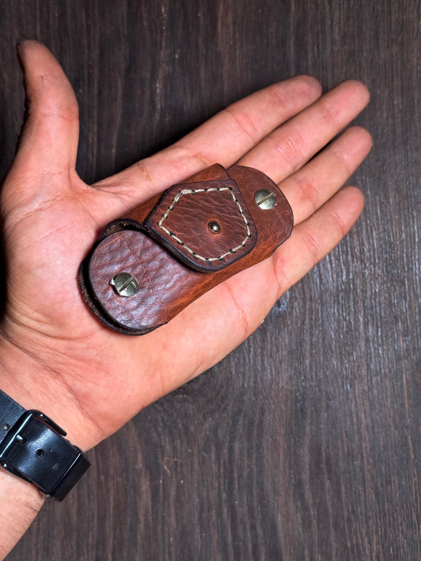 stitched key holder that holds upto 6-8 keys.