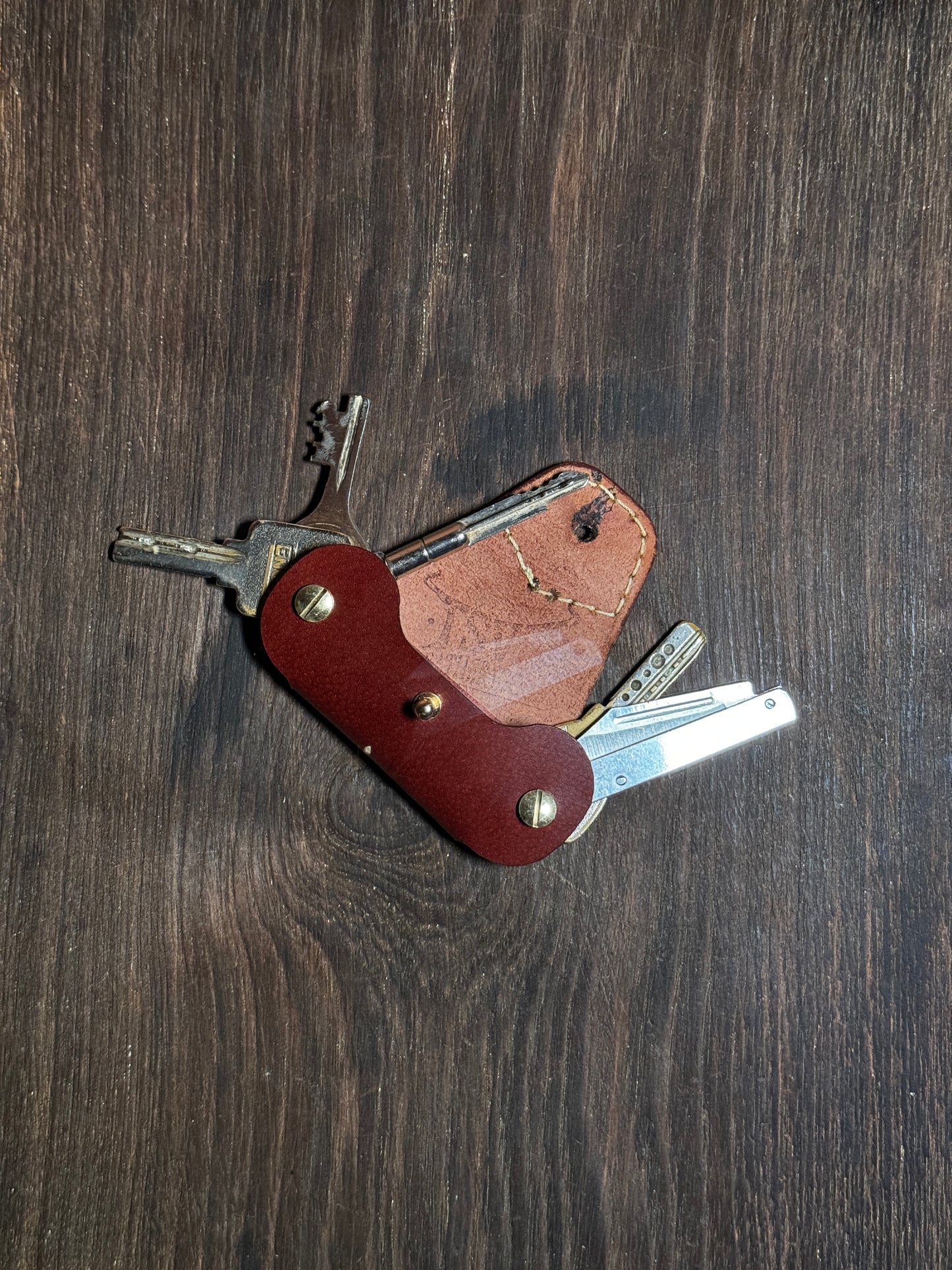 stitched key holder that holds upto 6-8 keys.